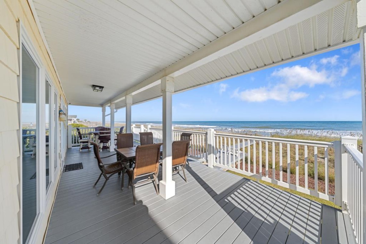 Large covered deck overlooks ocean