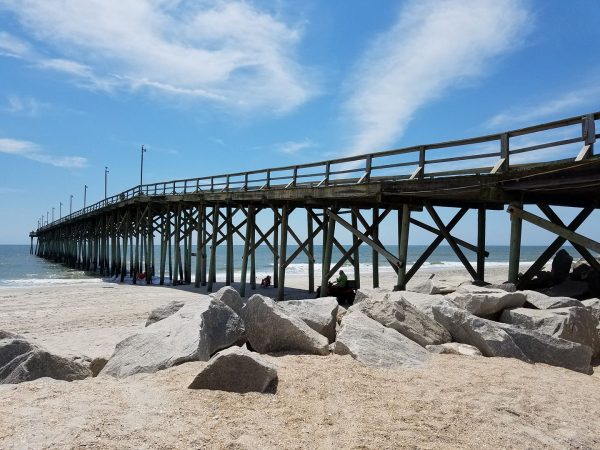 Image of the Carolina Beach Pier taken from the shore